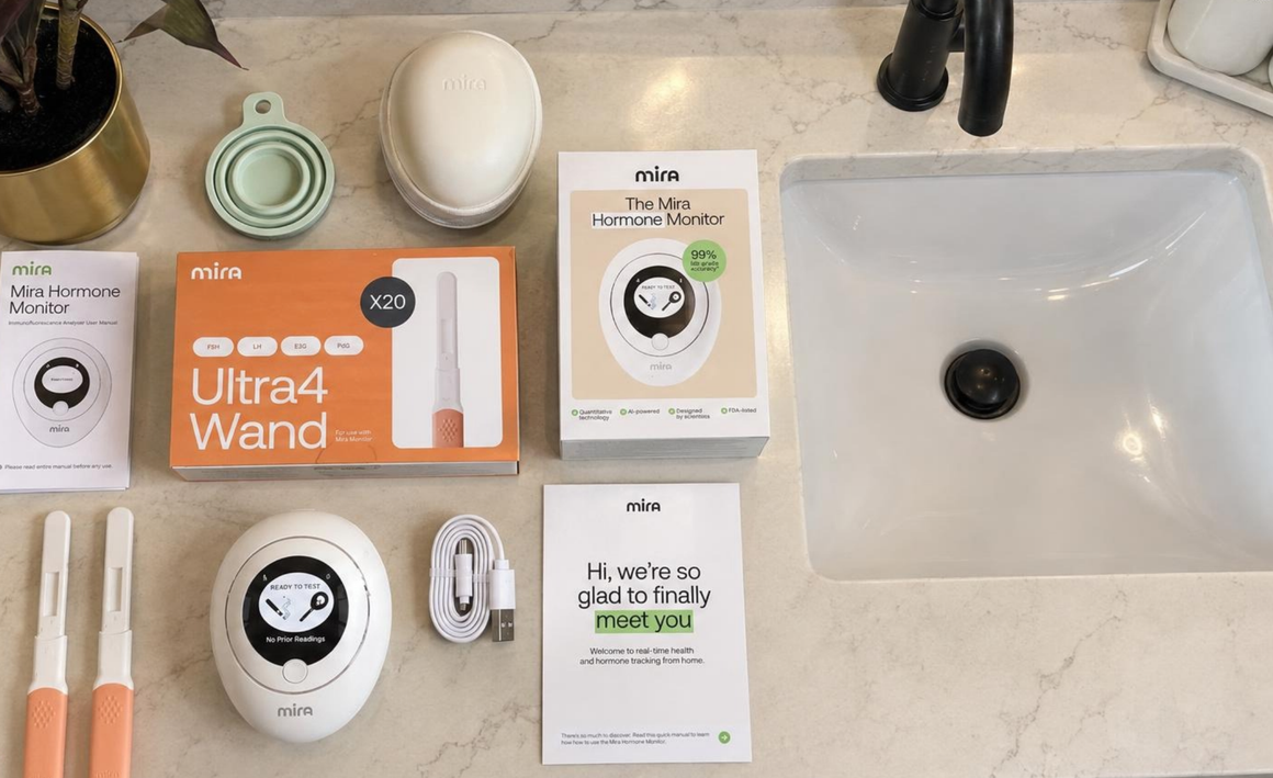 Mira Ultra4 kit laid out on a bathroom counter: monitor, Ultra4 wand box, wands, cup, case, cable, guide